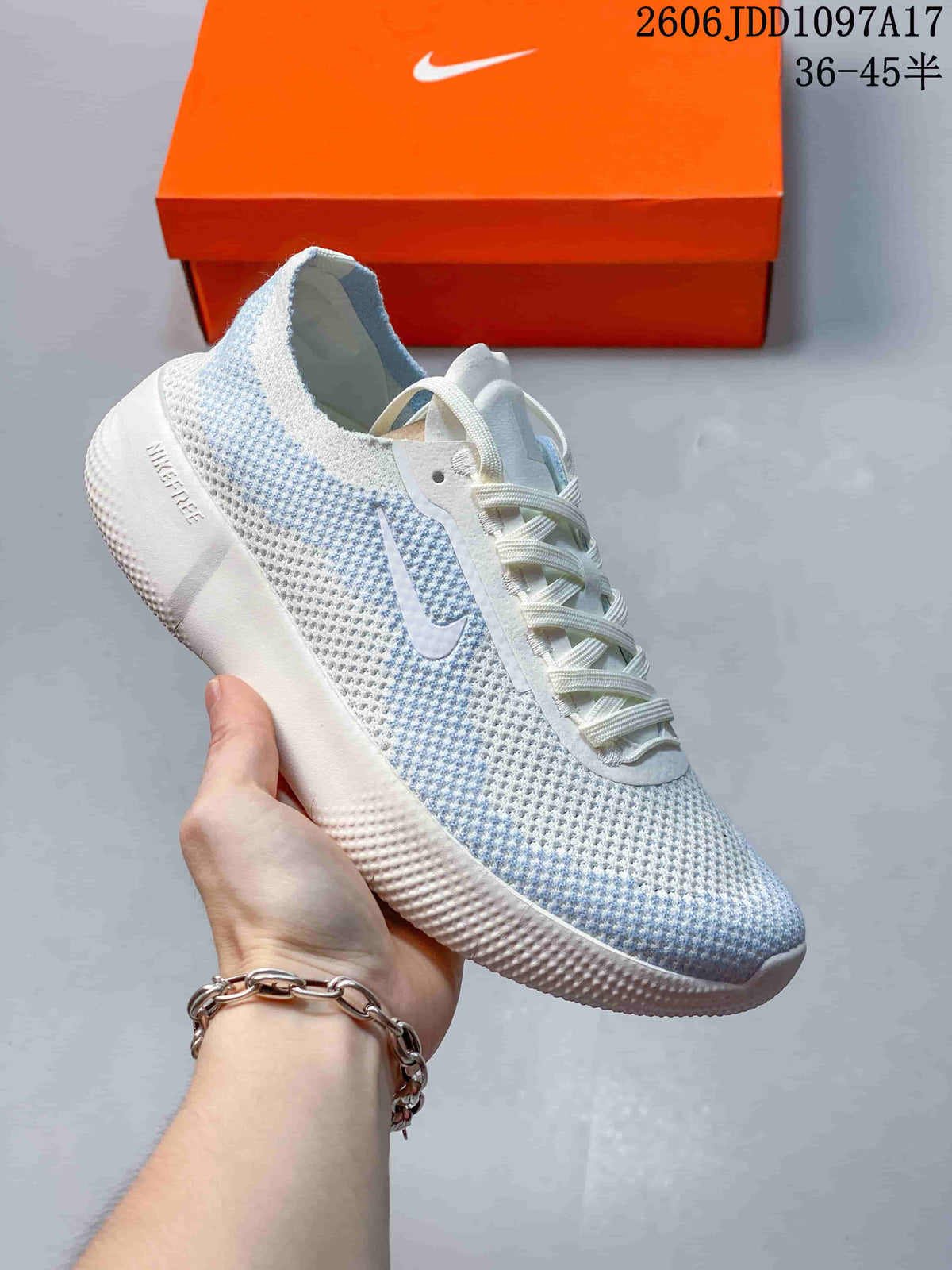 Pale blue and white Nike Free 2025 low-top shoe.