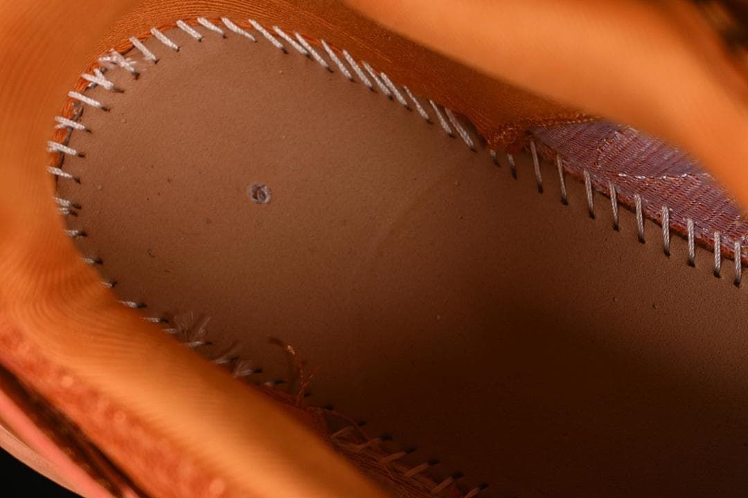 Interior close-up of the sneaker stitching and lining