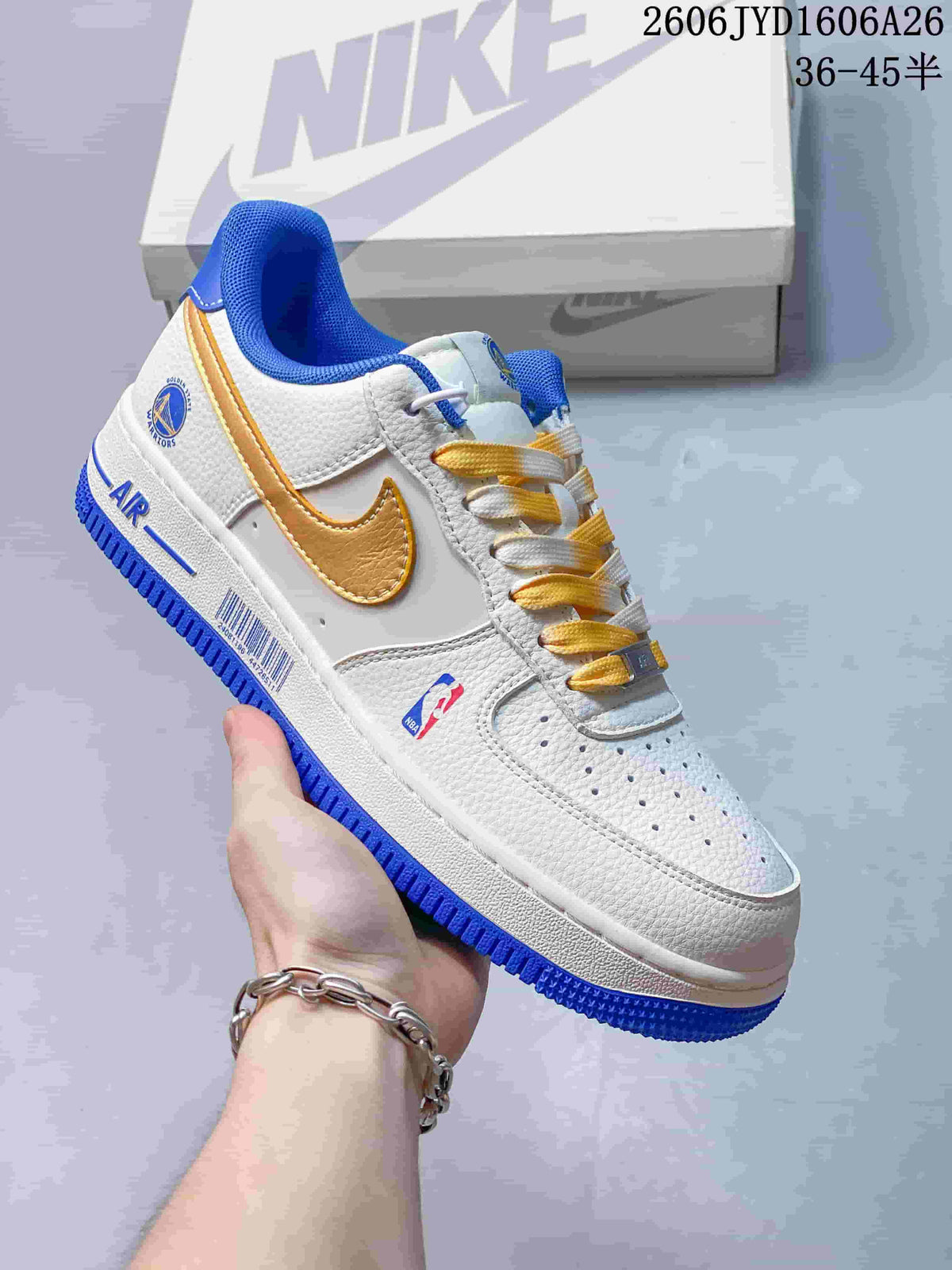 White low-top sneaker with gold Swoosh, blue trim and Golden State Warriors graphics