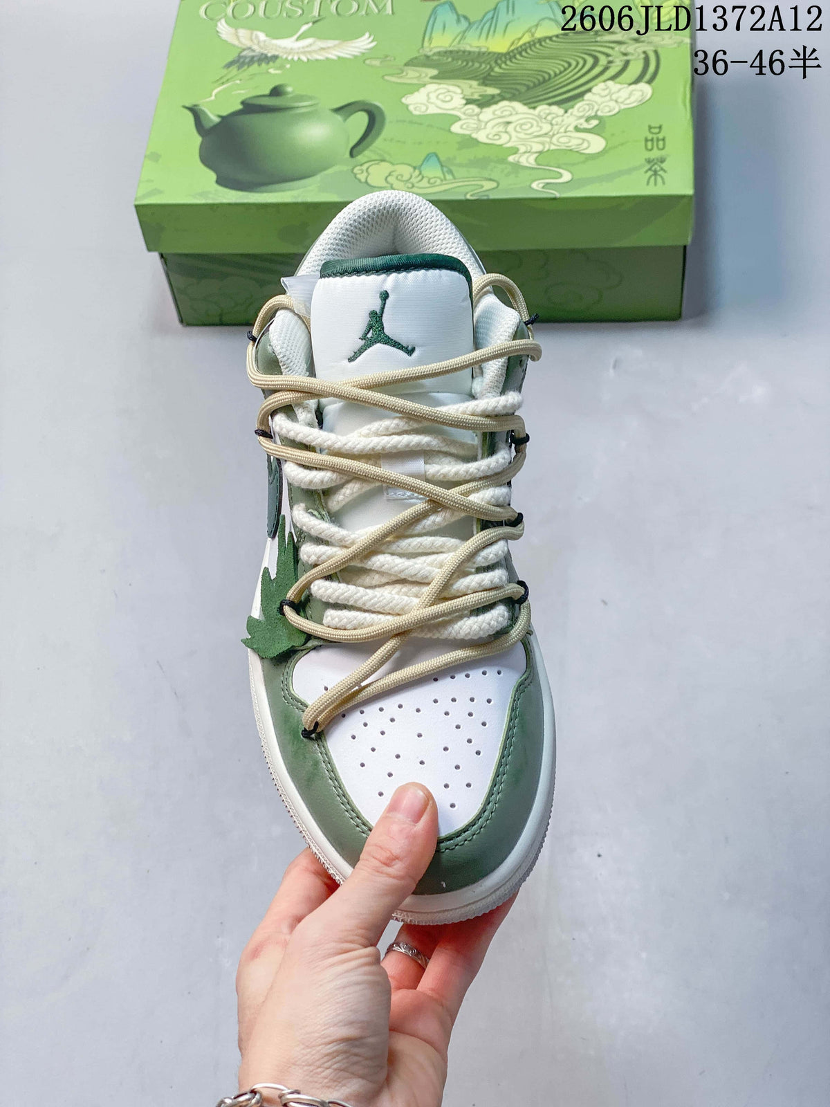 Top view showing the perforated toe and layered laces