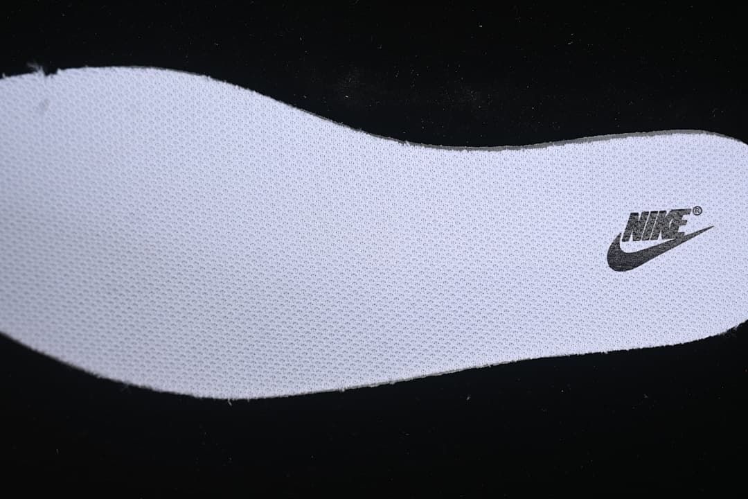 Close-up of a shoe insert with a visible Nike logo