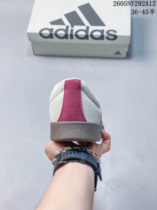 Rear view showing the burgundy heel panel and gum-colored outsole.