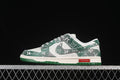 Side view of a green-and-white patterned low-top sneaker with a green outsole