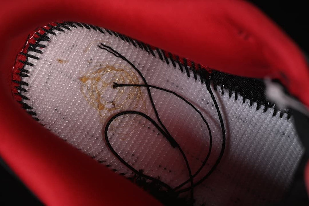 Close-up of stitching on the shoe interior