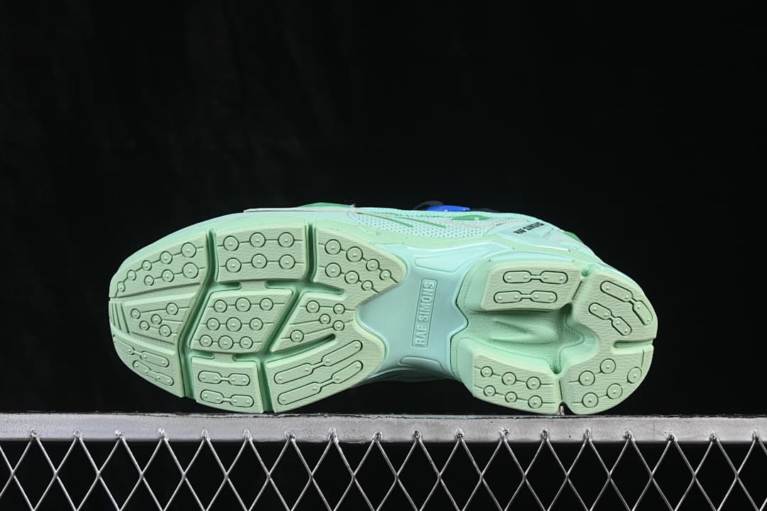 Underside view showing the mint outsole tread