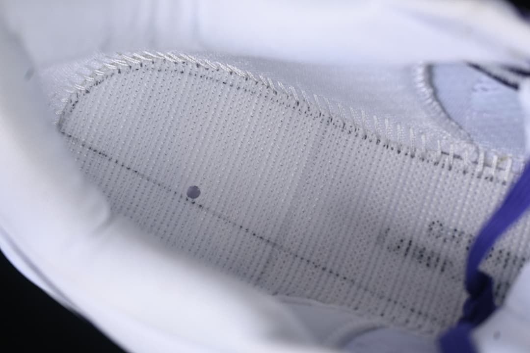 Close-up of the patterned upper stitching