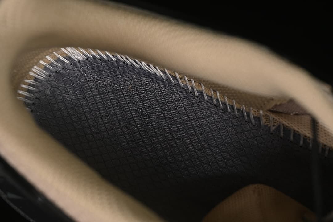 Close-up inside the shoe showing the lining and stitching.