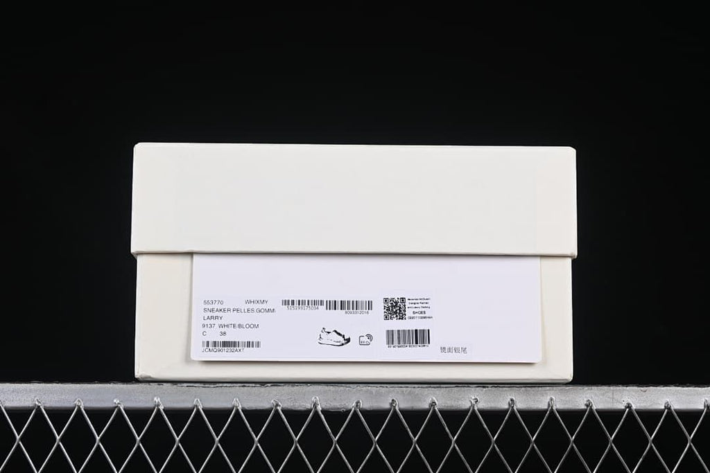 Shoebox label showing a photographed size marked 38