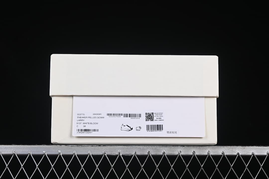 Shoebox label showing a photographed size marked 38