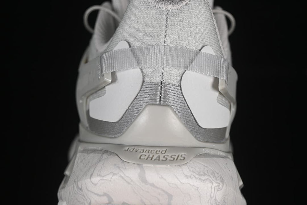 Rear view highlighting the heel structure and patterned midsole