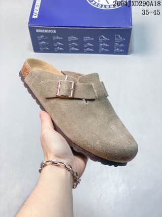 Angled side view showing the beige suede upper, adjustable buckle and textured outsole.