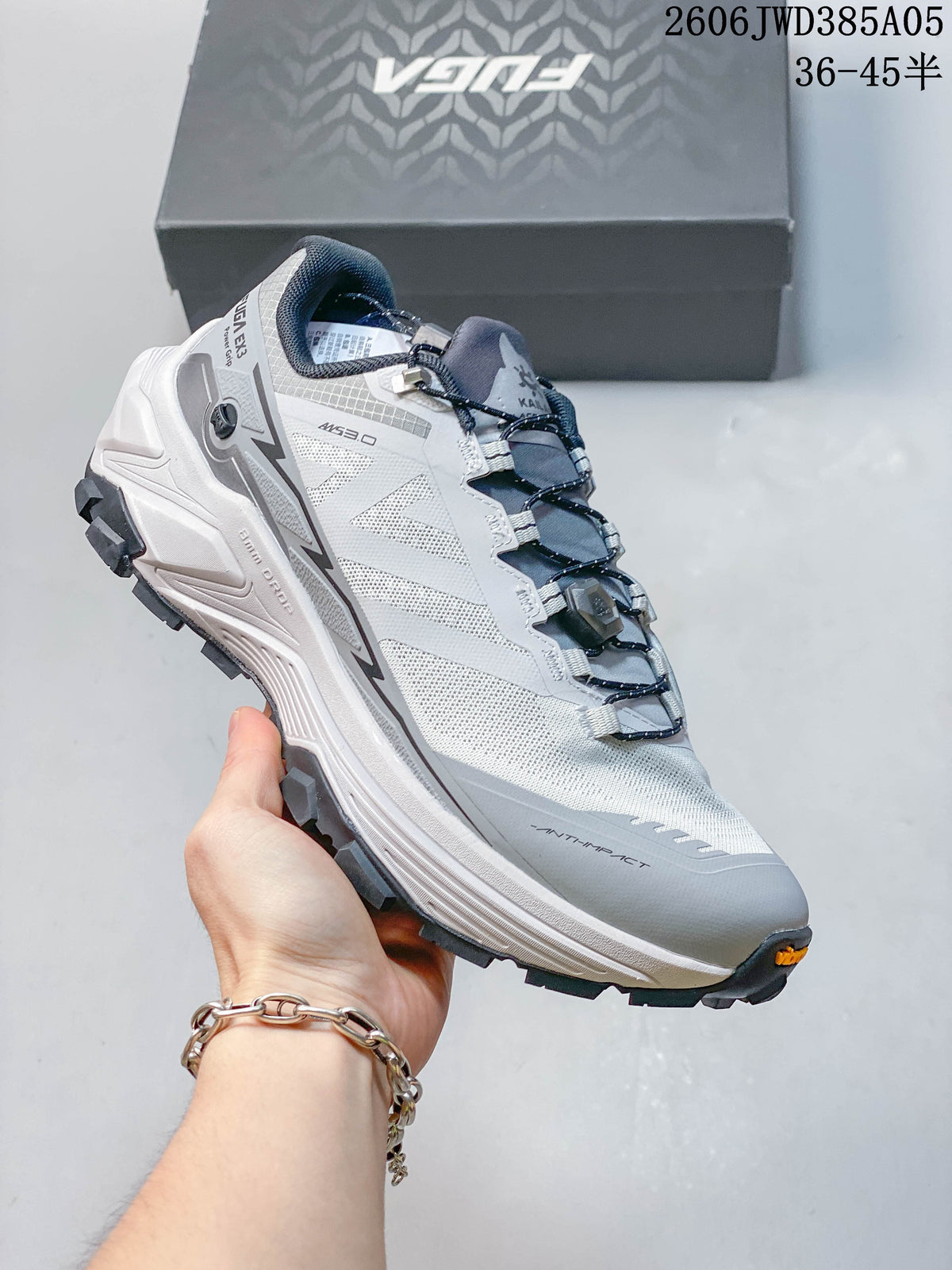 Angled side view of the Kailas Fuga Ex3 trail shoe and its rugged outsole