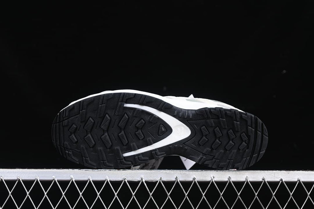Underside view showing the patterned black outsole