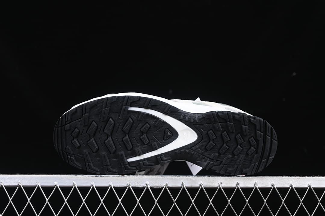 Underside view showing the patterned black outsole