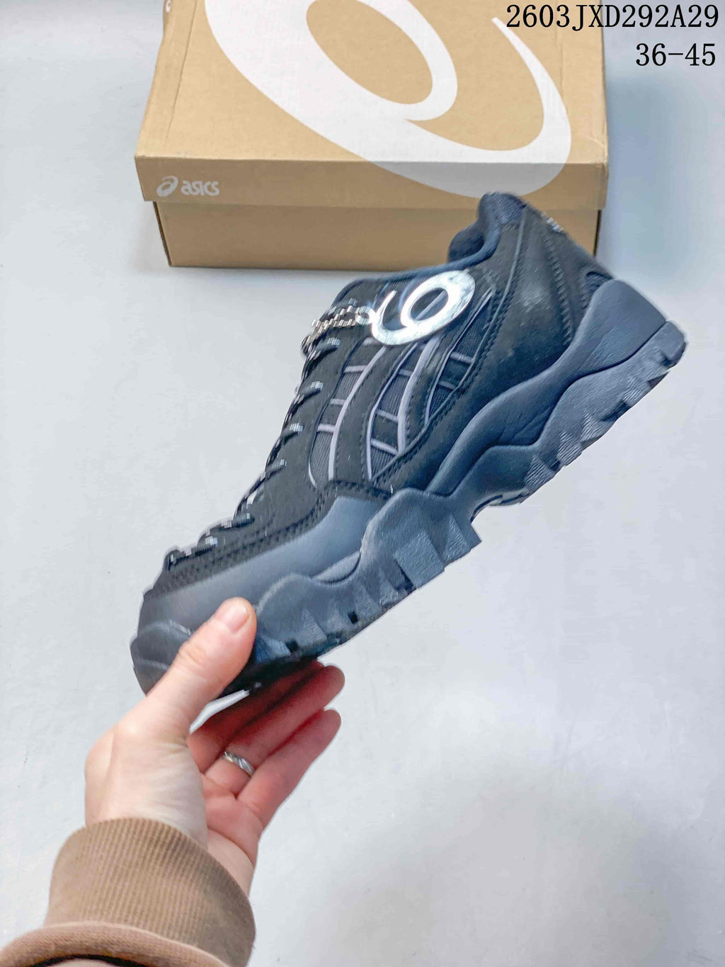Side profile showing the layered upper and rugged sole
