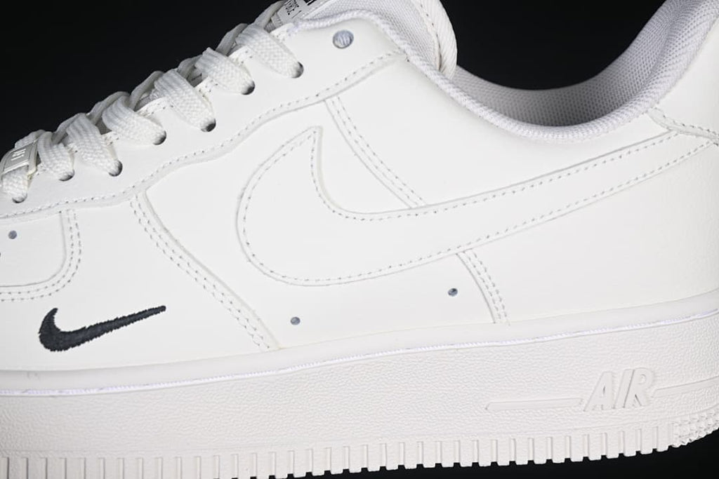Close-up of the white side panels, Swoosh details, and midsole