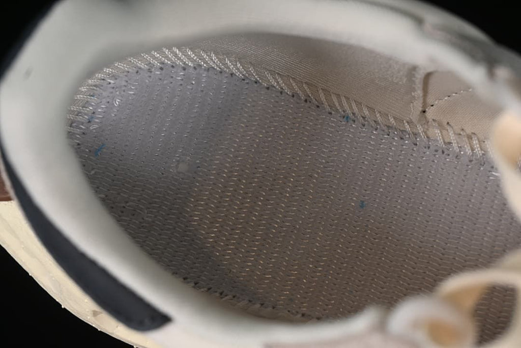 Close-up view inside the sneaker showing the lining and footbed.