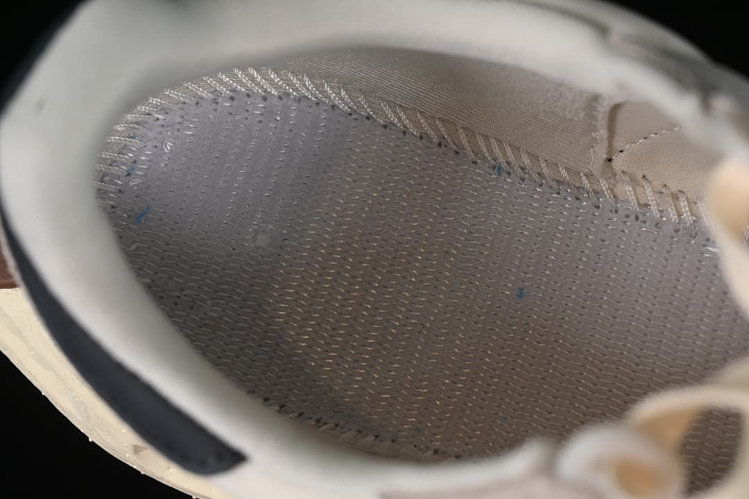 Close-up view inside the sneaker showing the lining and footbed.