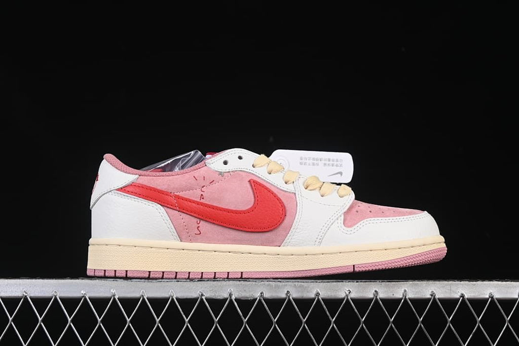 Side view of a low-top sneaker with pink panels and red Swoosh