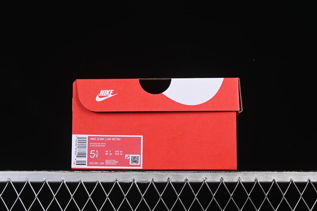 Red Nike shoe box with a label showing the style code and sample size