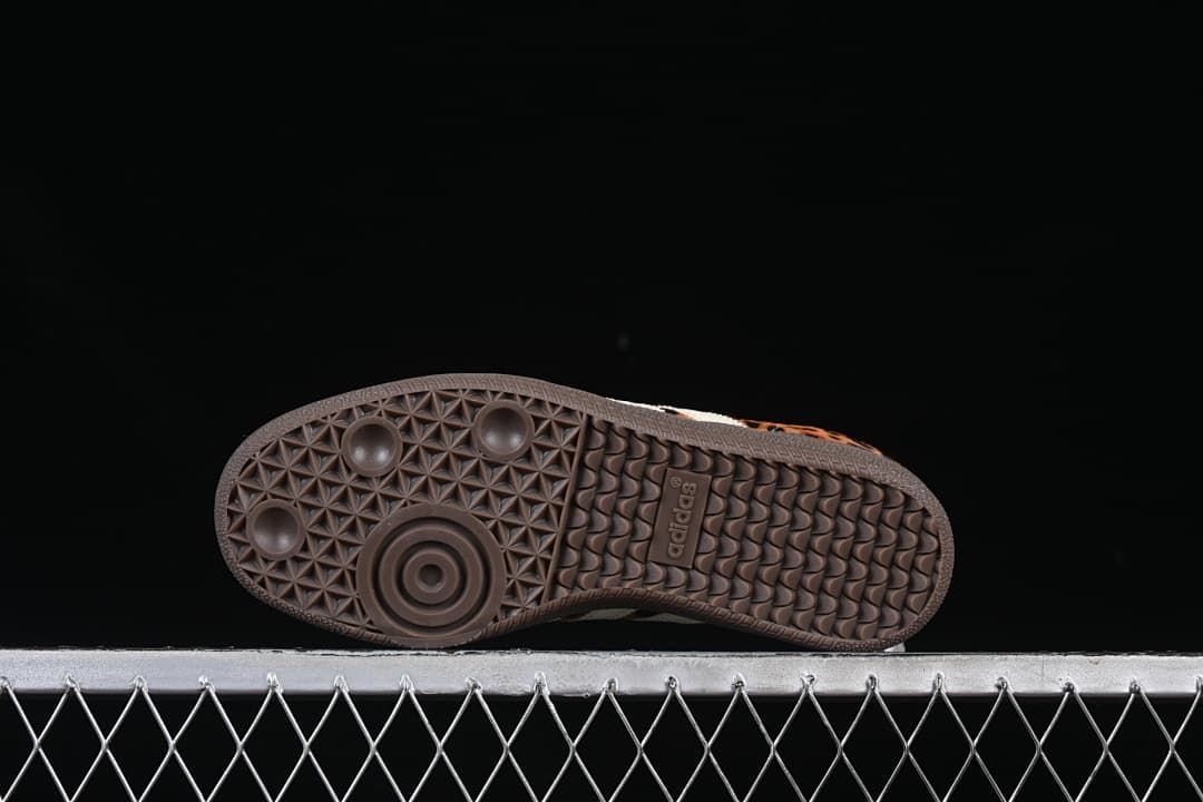Underside view of the dark brown patterned outsole