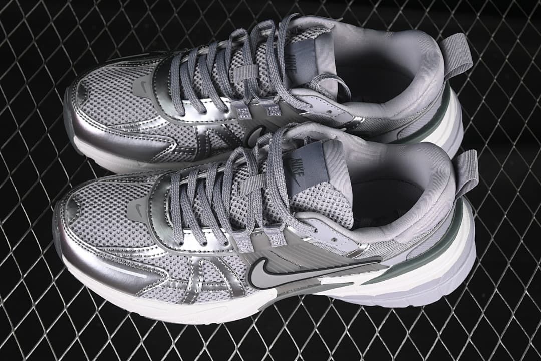 Pair of silver and grey Nike V2K Run sneakers viewed from above