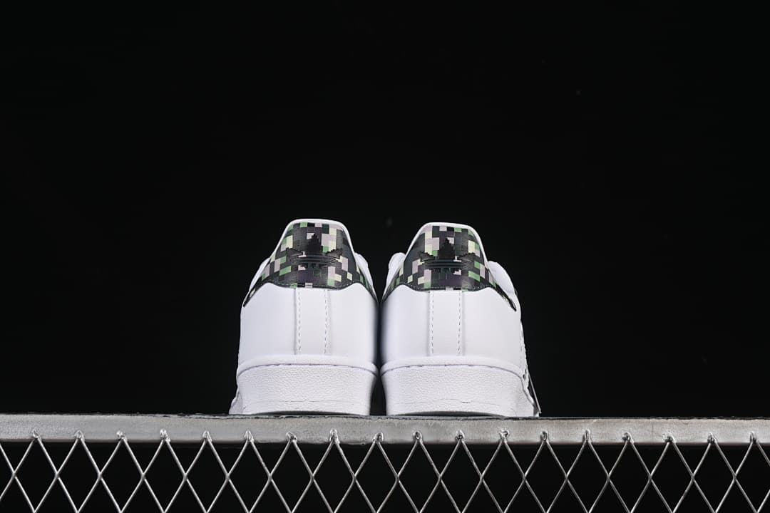 Rear view highlighting pixel-patterned heel panels