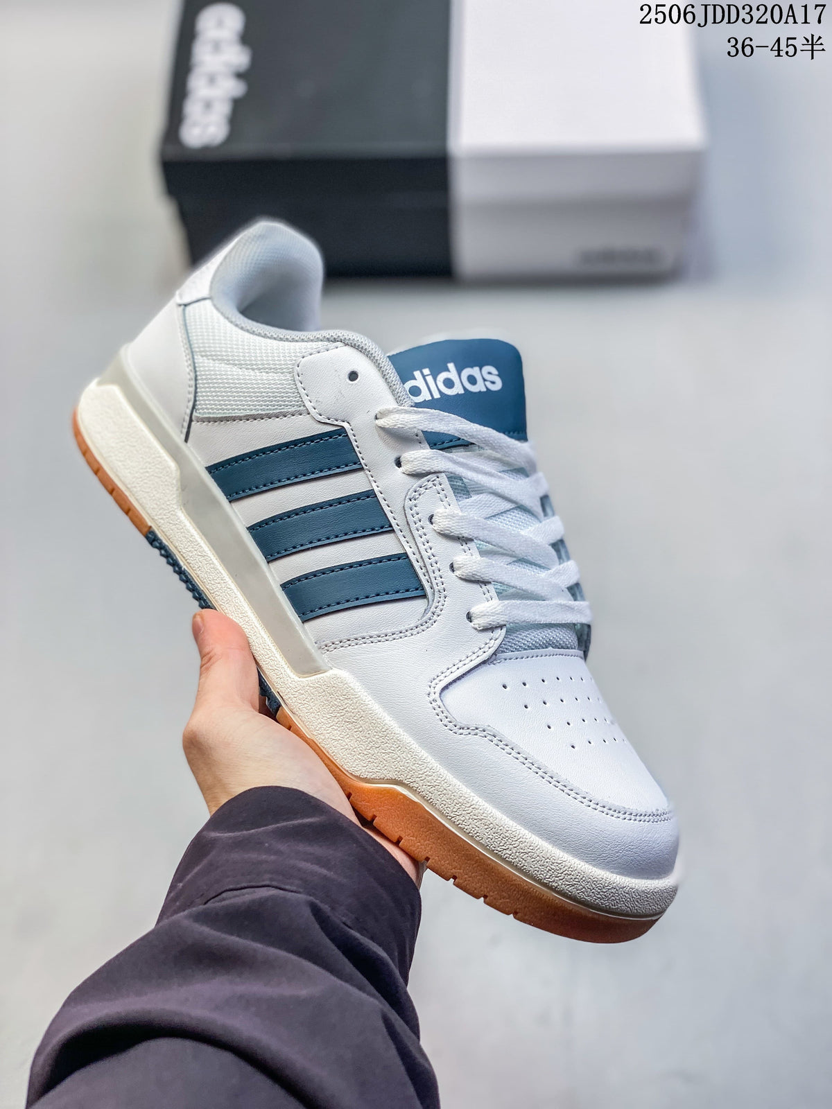 White adidas Entrap sneaker with blue stripes and gum-colored outsole