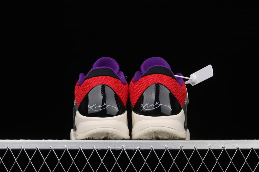 Rear view of the pair showing red heel fabric and signature panels