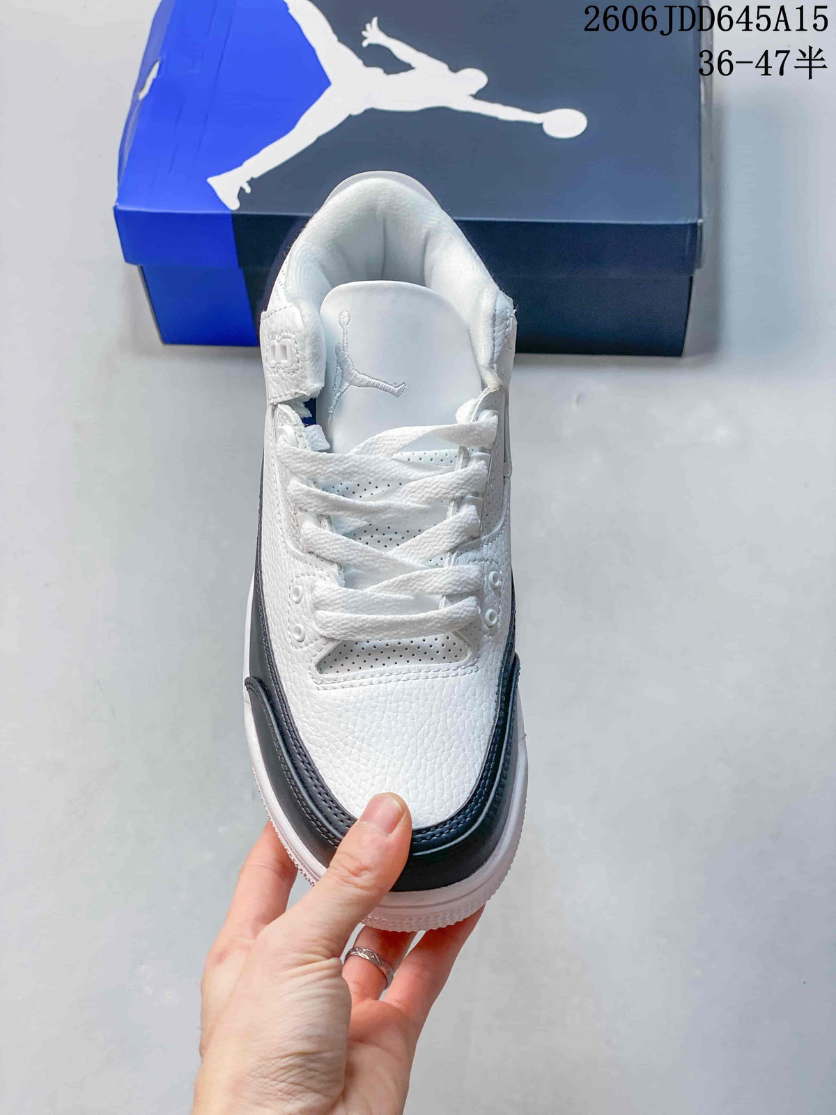 Top view showing the laces, perforated panels, and tongue logo