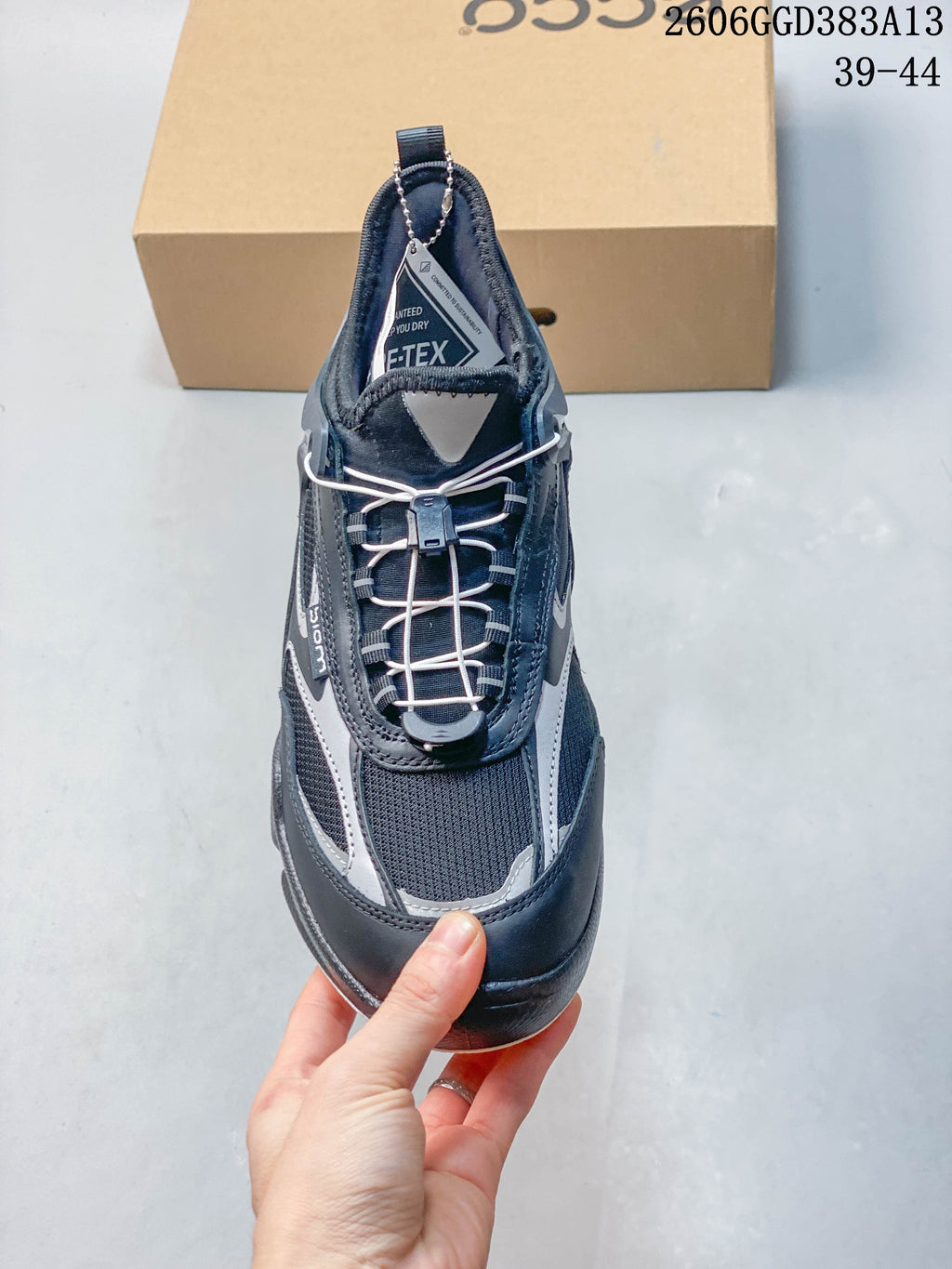 Top view showing the sneaker's cord-style closure and mesh toe area.