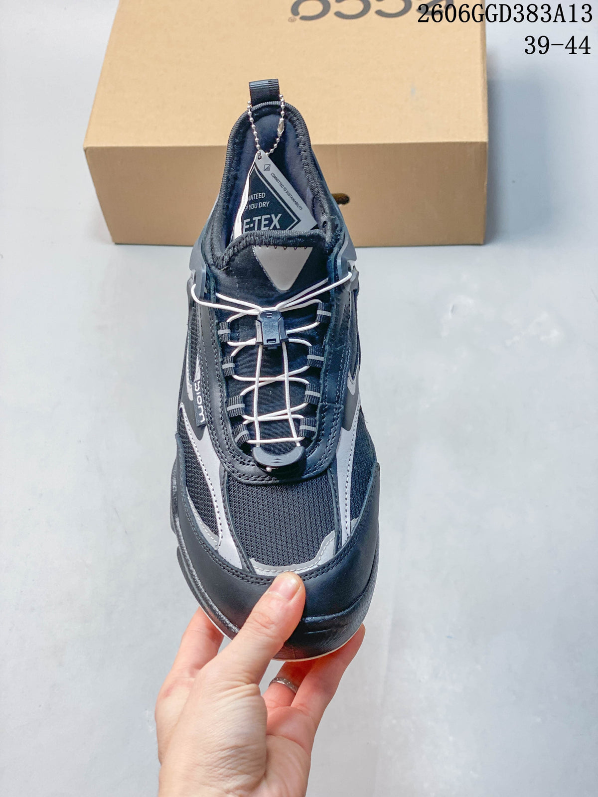 Top view showing the sneaker's cord-style closure and mesh toe area.