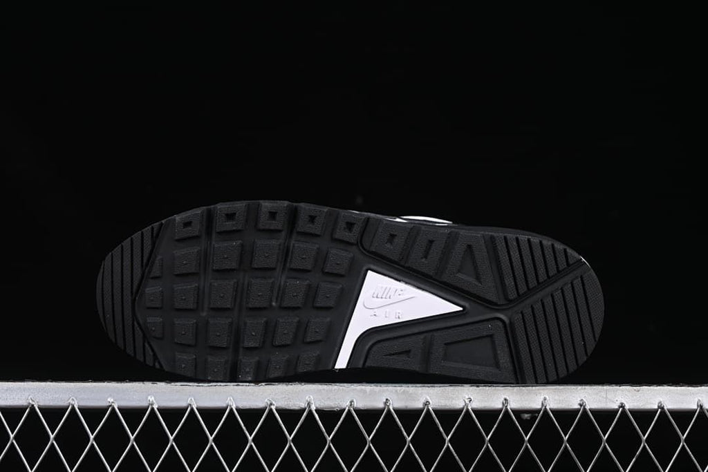 Underside view showing the black patterned outsole.
