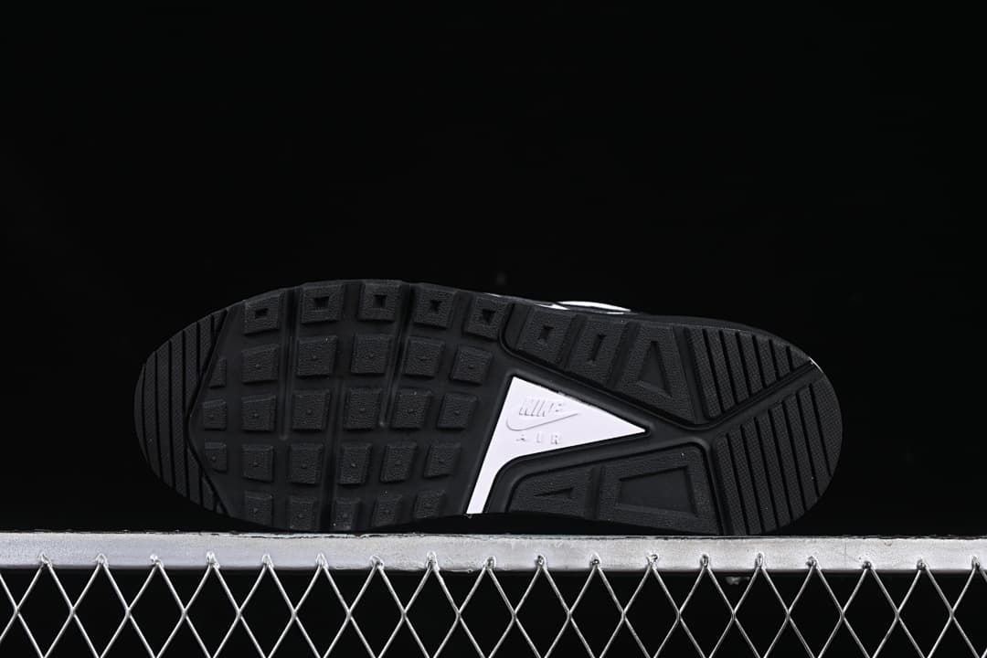 Underside view showing the black patterned outsole.