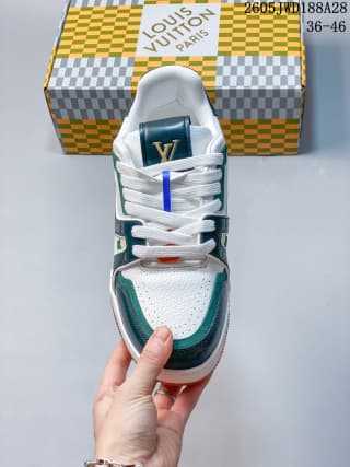 Top view of the sneaker showing its white laces and green toe overlays