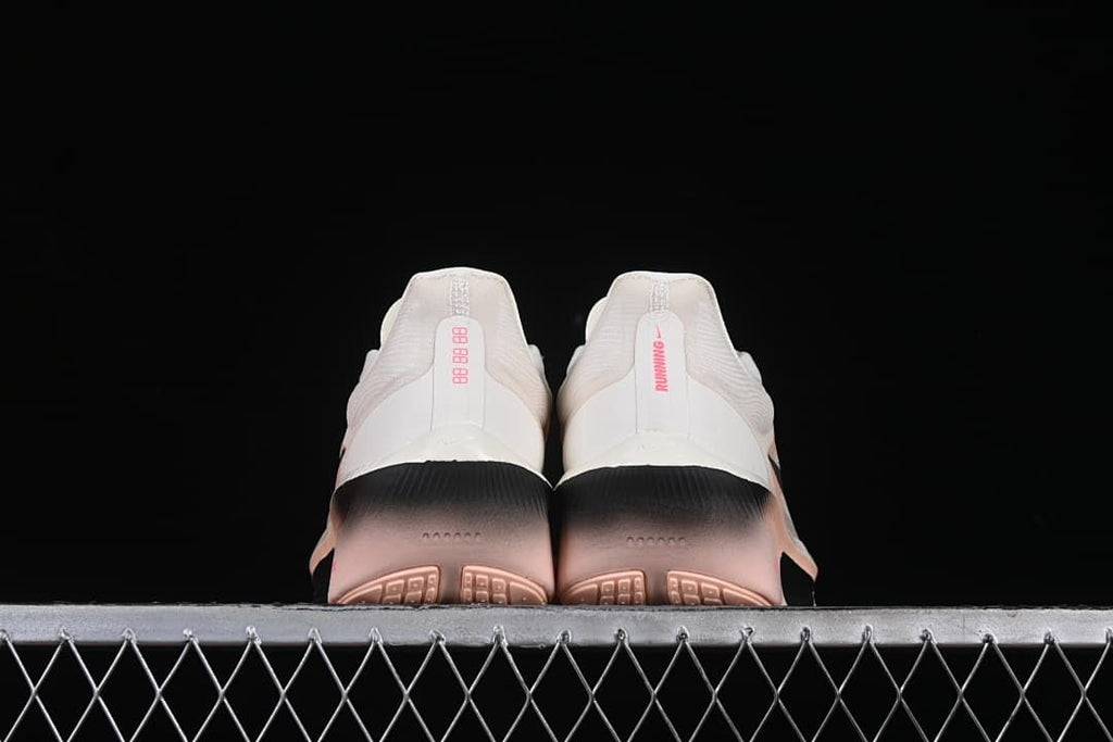 Rear view of both shoes showing their heel details