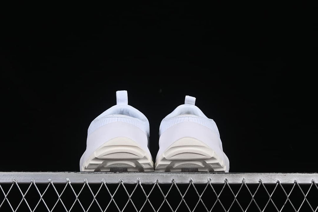 Rear view of the shoes showing the heel and outsole