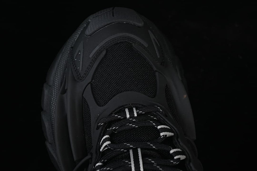 Top-down view of the sneaker toe and laces.
