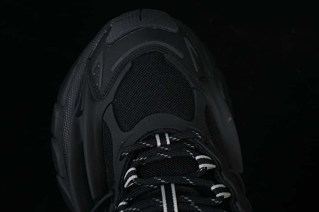 Top-down view of the sneaker toe and laces.