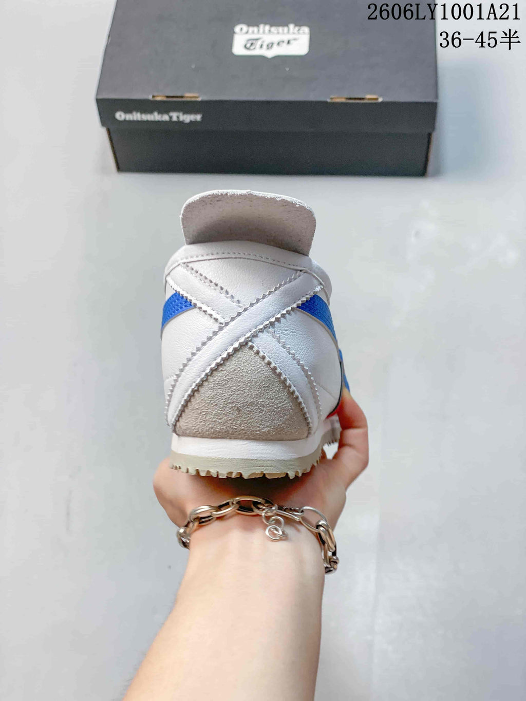Rear view showing the heel construction and contrasting panels