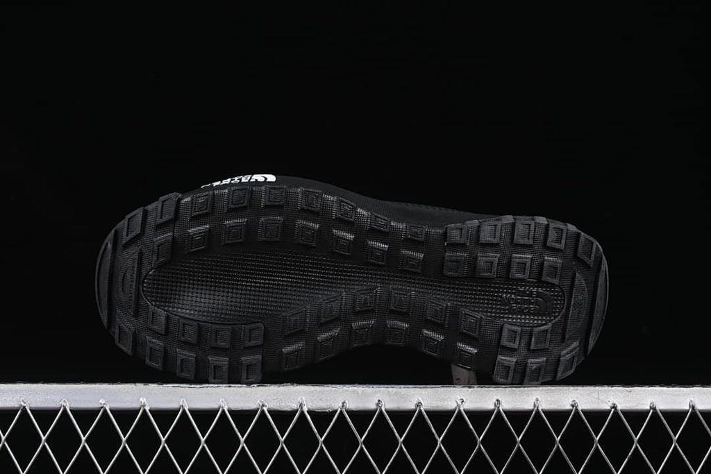 Underside view showing the lugged tread pattern