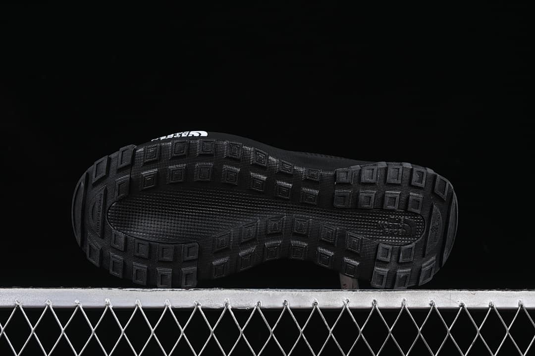 Underside view showing the lugged tread pattern