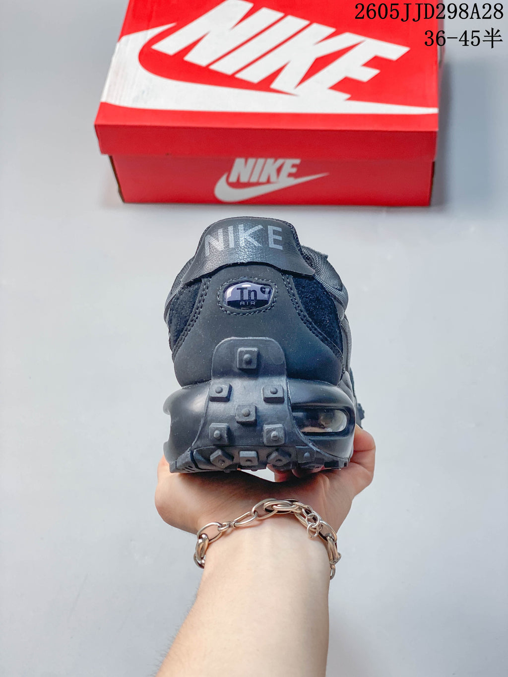 Rear view showing the heel, outsole, and visible air unit