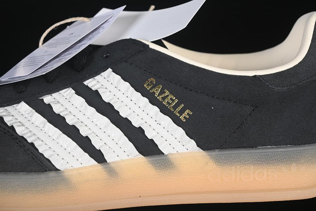 Close-up of the white side stripes, gold Gazelle lettering and gum-colored sole.