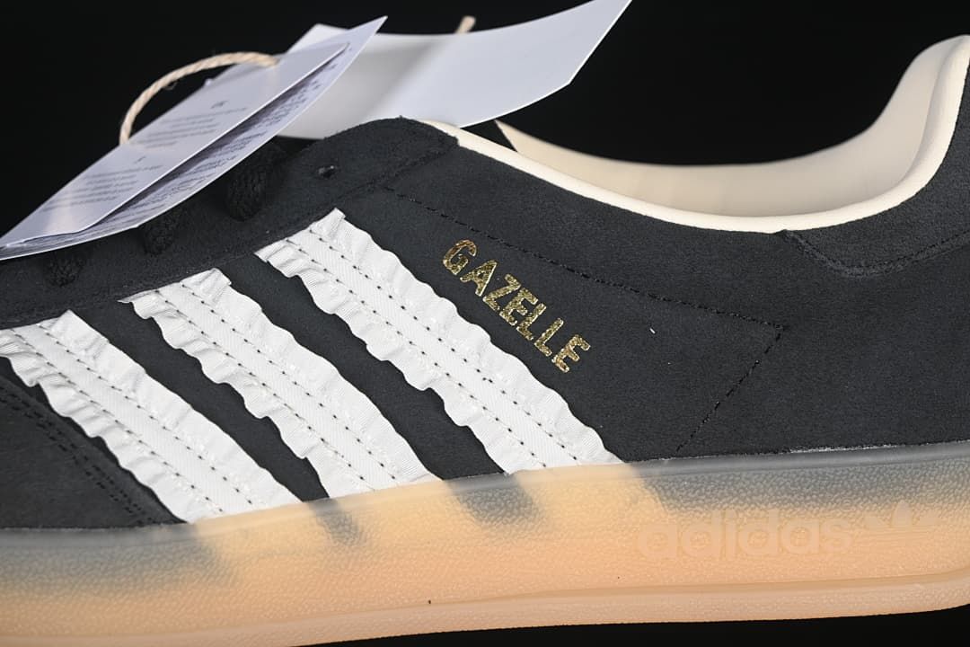 Close-up of the white side stripes, gold Gazelle lettering and gum-colored sole.