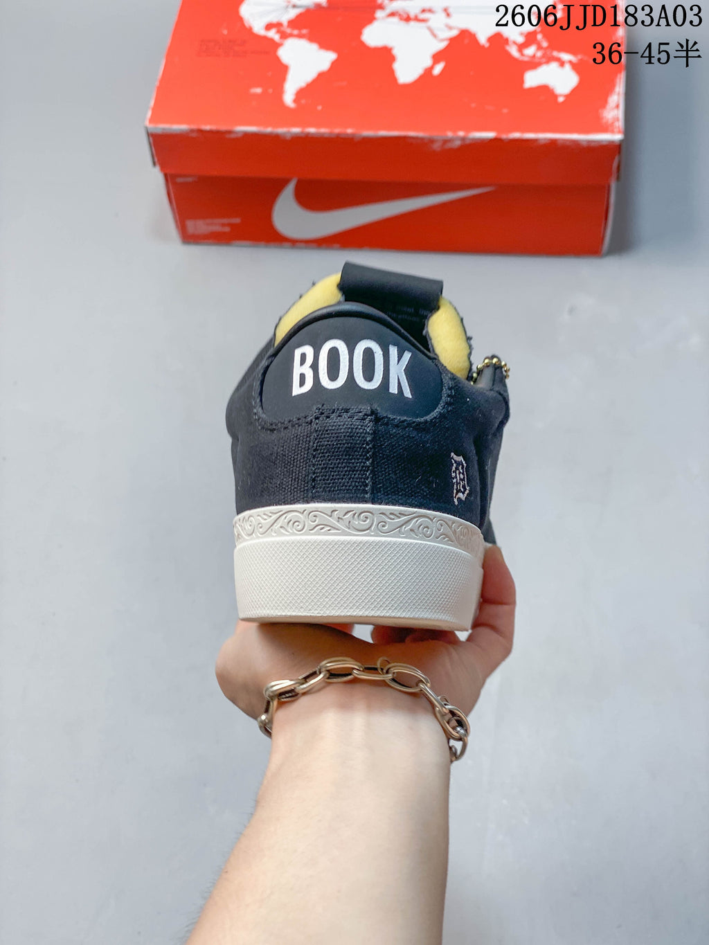 Rear view showing BOOK lettering and the patterned white sole edge