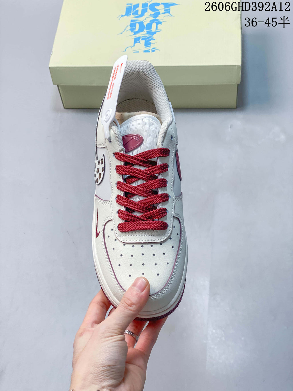Top view showing burgundy laces and perforated toe