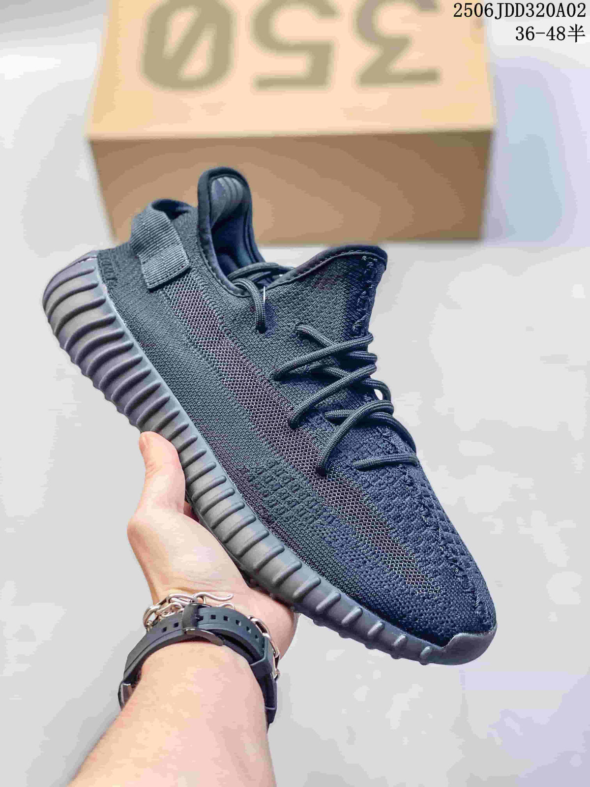 Dark navy knit-look sneaker with a subtle side stripe and ribbed sole
