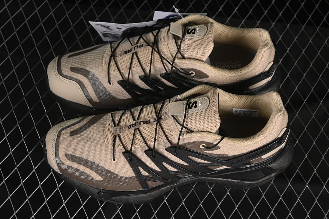 Pair of sand and charcoal shoes shown from above.