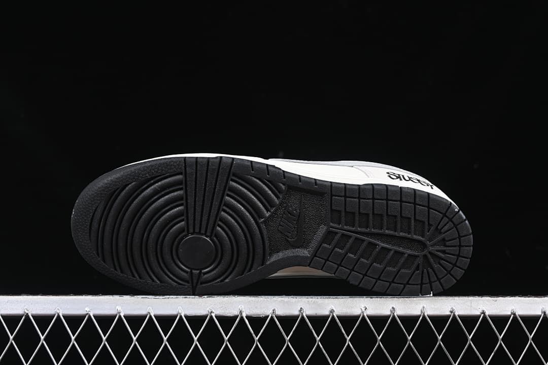 Underside view showing the black circular pivot outsole tread